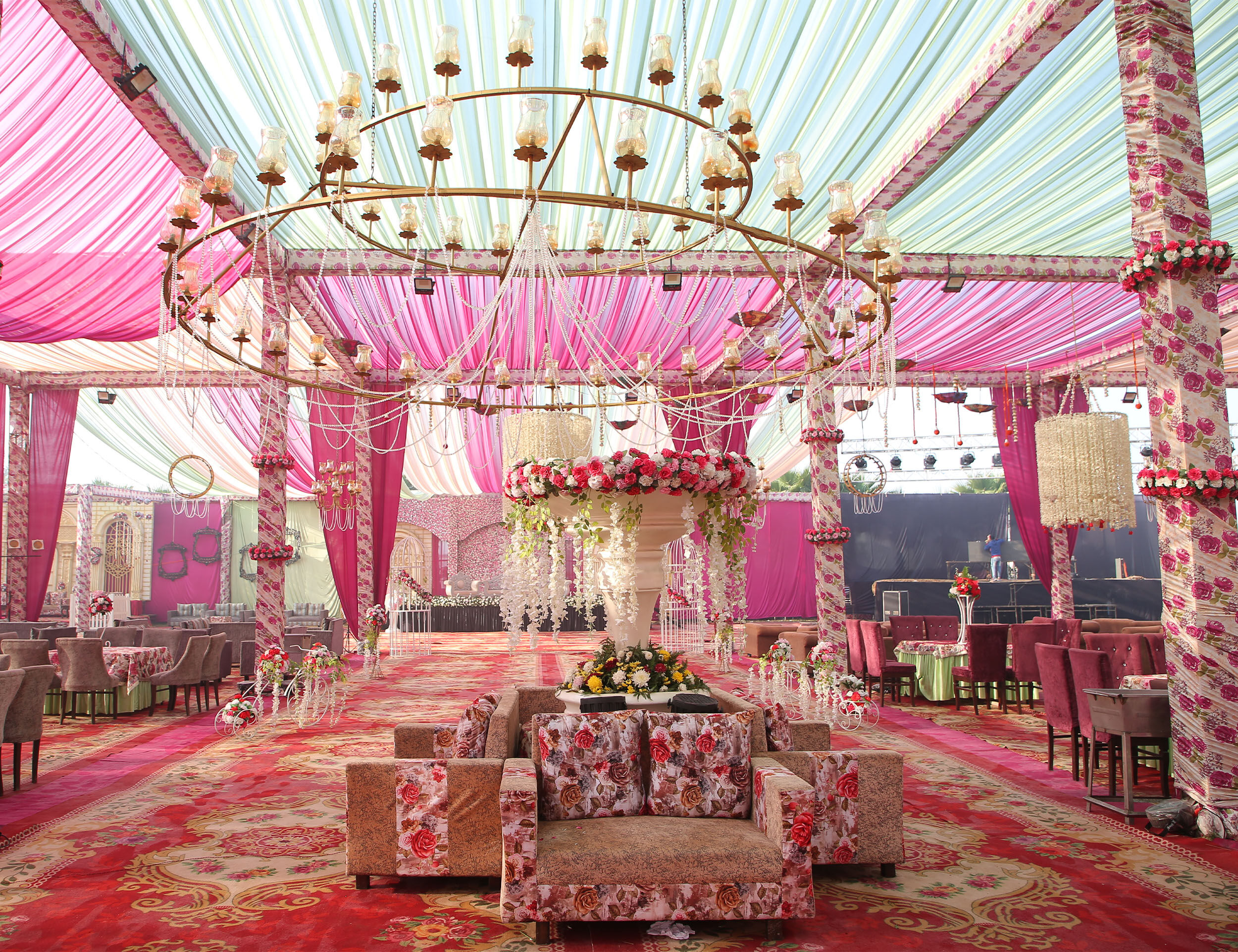 Charming pink wedding shower decoration with intricate floral and creative design elements.